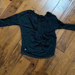 Lululemon shirt size 4. Feel free to bundle. Make an offer.